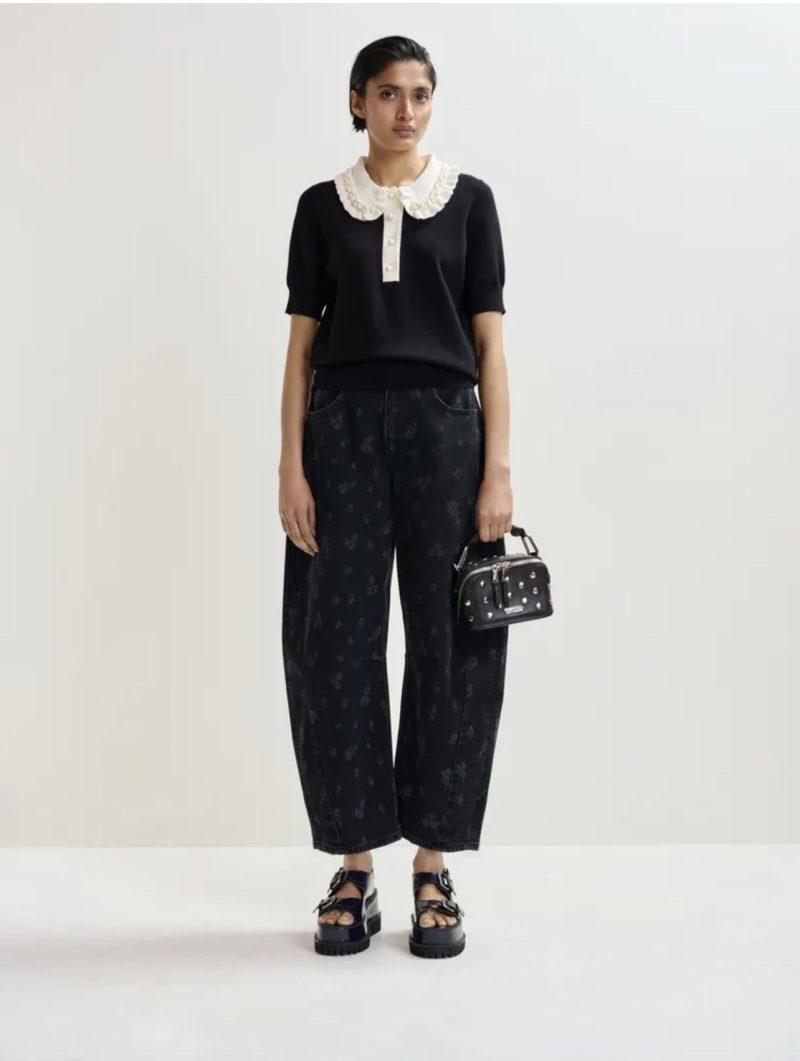 ESSENTIEL ANTWERP Polo en maille fine noir et blanc cassé à volants et perles Boutique rive gauche Belfort