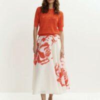 Jupe mi-longue plissée blanc cassé et rouge à fleurs boutique rive gauche Belfort