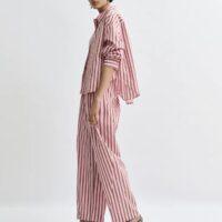 ESSENTIEL ANTWERP Pantalon fuselé rose et brun à rayures et strass