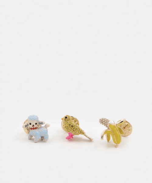 Trio de pin's en émail et strass bleus et jaunes