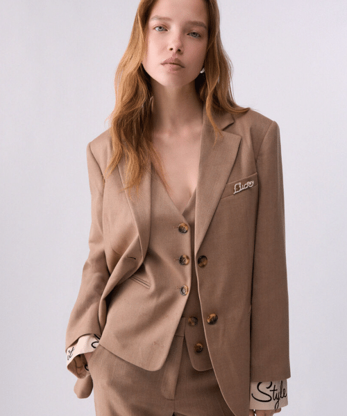 Blazer en tissus avec détails manches